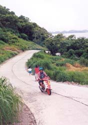 Motorcycling up from Tham Phang